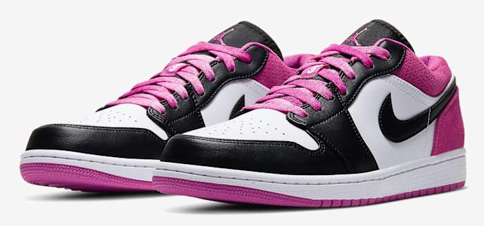 View of black, white, and pink Jordan shoes.